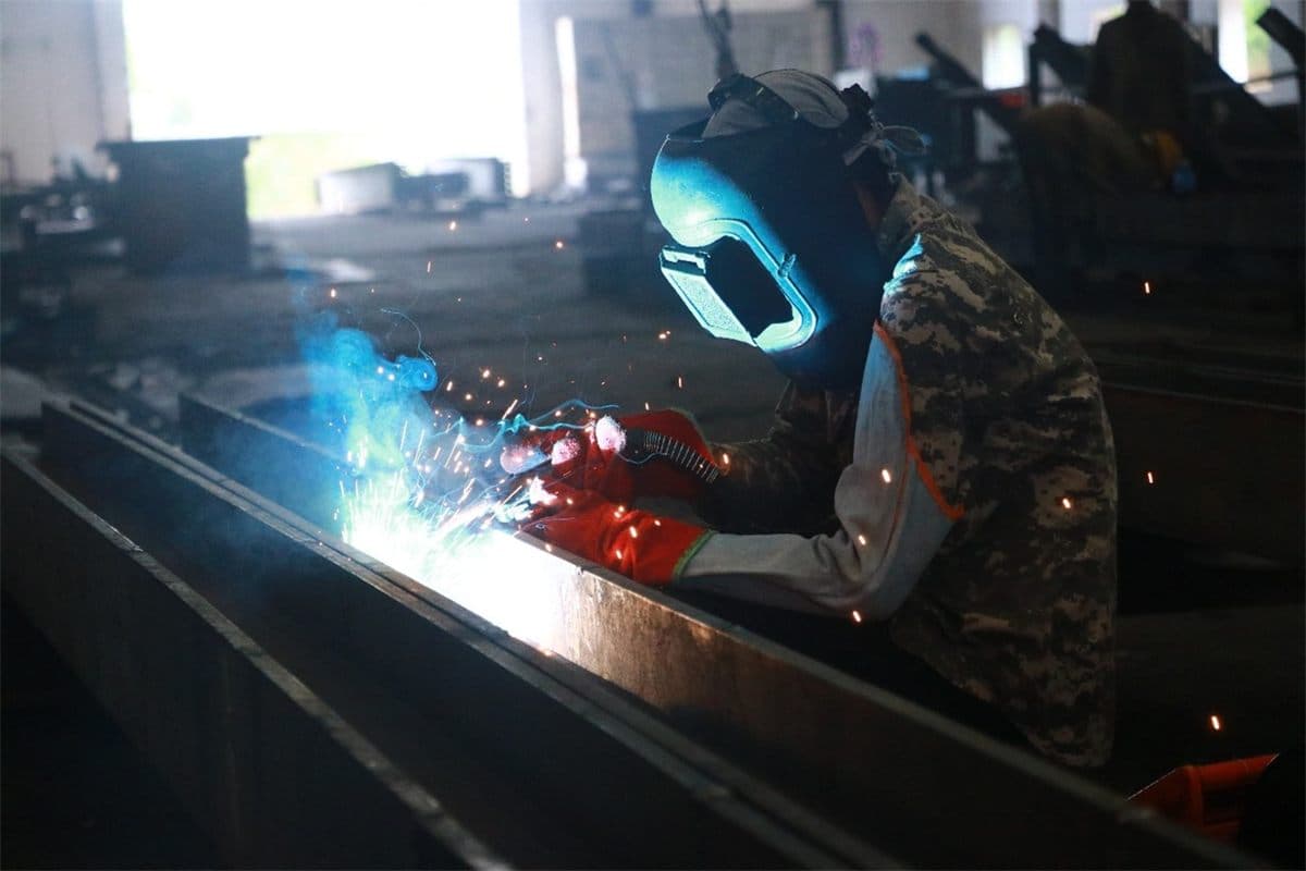 Welder joining a fabricated plate girder